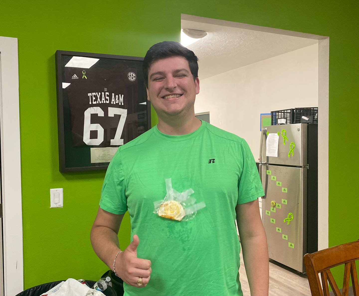 Wyatt Kiel with an egg on his shirt for EGGPOOL